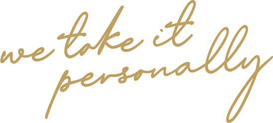 gold cursive text reading we take it personally 